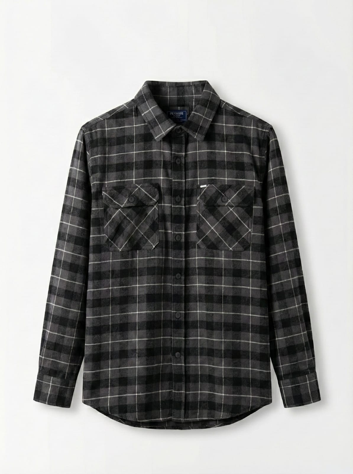 Black and gray plaid shirt on a white background